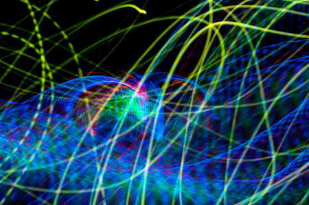 Abstract pattern of city lights from cars, windows, streetlights and bars