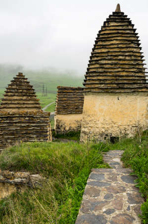 Ancient Alanian necropolis (City of dead) in Dargavs village, North Ossetia Alania, Russiaの写真素材