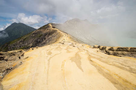 Ijen volcano with turquoise-colored acidic crater lake in East Java, Indonesiaの写真素材