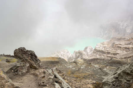 Ijen volcano with turquoise-colored acidic crater lake in East Java, Indonesiaの写真素材