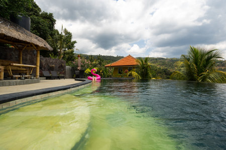 View of the swimming pool in the hotel on island Bali, Indonesiaのeditorial素材