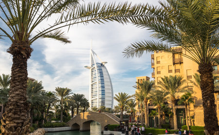 DUBAI, UNITED ARAB EMIRATES - 05 DECEMBER, 2018: Cityscape view from Madinat Jumeirah on famous Seven Star Hotel Burj Al Arab in Dubai, United Arab Emiratesのeditorial素材