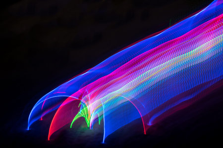 Abstract pattern of city lights from cars, windows, streetlights and bars