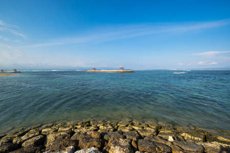 The coast of Indian ocean on resort Sanur of island Bali, Indonesiaの写真素材