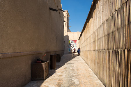 DUBAI, UNITED ARAB EMIRATES - 04 DECEMBER, 2018: Traditional Arabic street in historical Al Fahidi district, Al Bastakiya. Dubai, United Arab Emiratesのeditorial素材