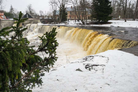 Partly frozen Keila-Joa waterfall in winter near Tallinn, Estoniaの写真素材