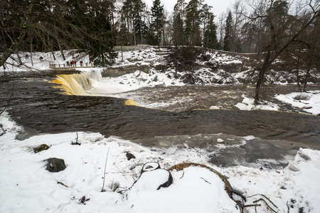 Partly frozen Keila-Joa waterfall in winter near Tallinn, Estoniaの写真素材