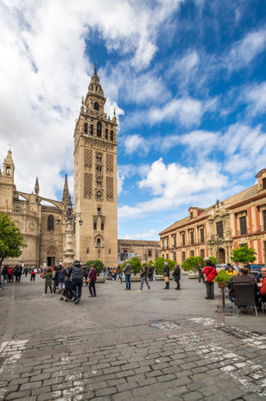 SEVILLE, SPAIN - 06 APRIL, 2019: View of the Cathedral of Seville with the Giralda in Seville, a big tourist center in Spainのeditorial素材