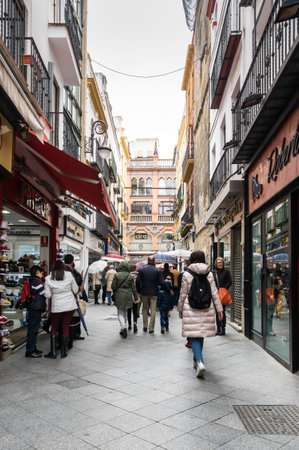 SEVILLE, SPAIN - 07 APRIL, 2019: View of the street in the historical center of Seville, a big tourist center in Spainのeditorial素材