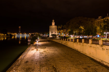 SEVILLE, SPAIN - 07 APRIL, 2019: Torre del Oro, historical limestone Tower of Gold in Seville, a big tourist center in Spainのeditorial素材