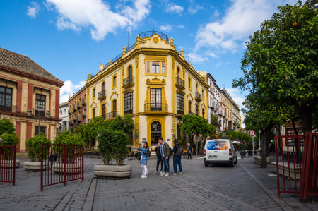 SEVILLE, SPAIN - 08 APRIL, 2019: View of the street in the historical center of Seville, a big...