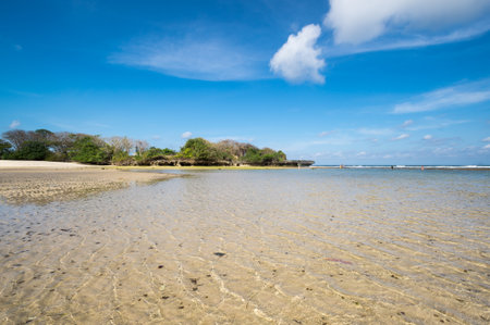 The coast of Indian ocean on island Bali, Indonesiaの写真素材