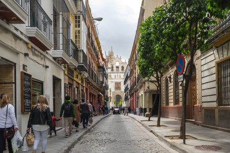 SEVILLE, SPAIN - 06 APRIL, 2019: View of the street in the historical center of Seville, a big tourist center in Spainのeditorial素材