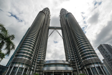 KUALA LUMPUR, MALAYSIA - 01 FEBRUARY, 2020: The Petronas Towers, also known as the Petronas Twin Towers are twin skyscrapers in Kuala Lumpur, Malaysiaのeditorial素材