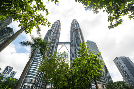KUALA LUMPUR, MALAYSIA - 01 FEBRUARY, 2020: The Petronas Towers, also known as the Petronas Twin Towers are twin skyscrapers in Kuala Lumpur, Malaysiaのeditorial素材