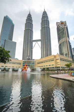 KUALA LUMPUR, MALAYSIA - 03 FEBRUARY, 2020: The Petronas Towers, also known as the Petronas Twin Towers are twin skyscrapers in Kuala Lumpur, Malaysiaのeditorial素材