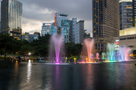 KUALA LUMPUR, MALAYSIA - FEBRUARY 03, 2020: Colorful dancing fountain in KLCC Park in Kuala Lumpur, the capital city of Malaysiaのeditorial素材