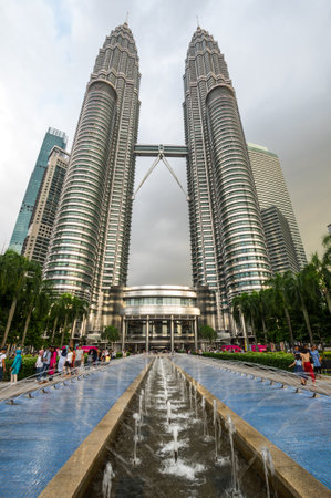 KUALA LUMPUR, MALAYSIA - 03 FEBRUARY, 2020: The Petronas Towers, also known as the Petronas Twin Towers are twin skyscrapers in Kuala Lumpur, Malaysiaのeditorial素材