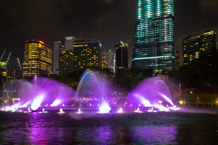 KUALA LUMPUR, MALAYSIA - FEBRUARY 03, 2020: Colorful dancing fountain in KLCC Park in Kuala Lumpur, the capital city of Malaysiaのeditorial素材