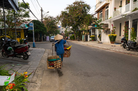 HOI AN, VIETNAM - 14 FEBRUARY, 2020: Street of Hoi An, city on the central Vietnamese coast, a well-preserved example of the important Southeast Asian trading portのeditorial素材