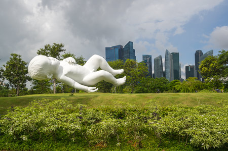 SINGAPORE - 19 FEBRUARY, 2020: Statue of sleeping child in Gardens by the Bay in Singaporeのeditorial素材
