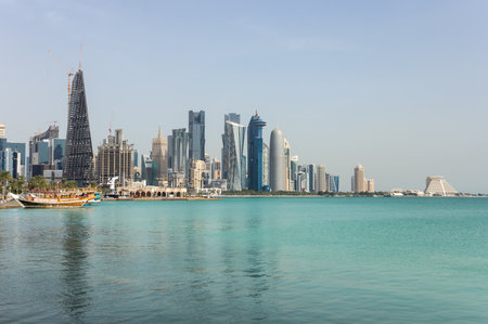Panoramic view with modern skyscrapers in the center of Doha, the capital and most populous city of the State of Qatarの写真素材