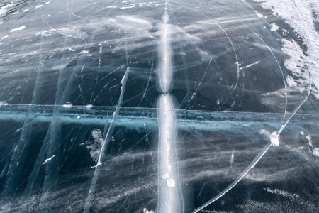 Ice of Lake Baikal, the deepest and largest freshwater lake by volume in the world, located in southern Siberia, Russiaの写真素材