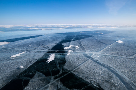 Ice of Lake Baikal, the deepest and largest freshwater lake by volume in the world, located in southern Siberia, Russiaの写真素材