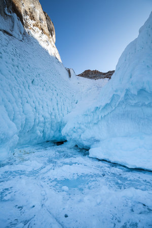 Coast of lake Baikal in winter, the deepest and largest freshwater lake by volume in the world, located in southern Siberia, Russiaの写真素材