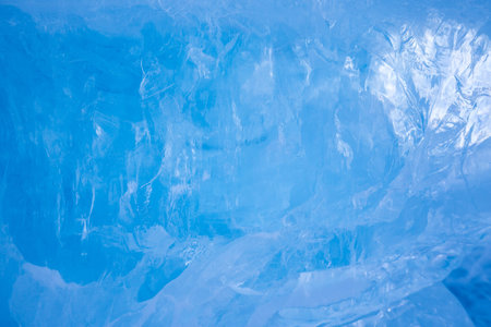 Ice of Lake Baikal, the deepest and largest freshwater lake by volume in the world, located in...