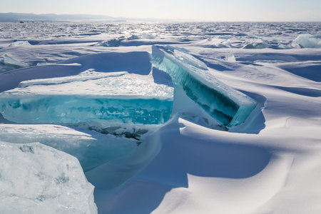 Hummocks on Lake Baikal, the deepest and largest freshwater lake by volume in the world, located in...