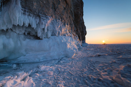 Coast of lake Baikal in winter, the deepest and largest freshwater lake by volume in the world, located in southern Siberia, Russiaの写真素材