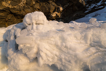 Coast of lake Baikal in winter, the deepest and largest freshwater lake by volume in the world,...