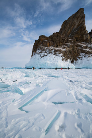 Coast of lake Baikal in winter, the deepest and largest freshwater lake by volume in the world,...