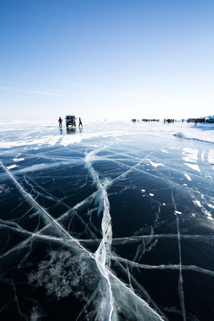 Ice of Lake Baikal, the deepest and largest freshwater lake by volume in the world, located in...