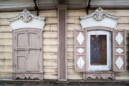 Facade of typical Russian log house, located in the historical center of Irkutsk, Siberia, Russiaの写真素材