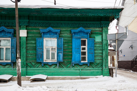 Facade of typical Russian log house, located in the historical center of Irkutsk, Siberia, Russiaの写真素材
