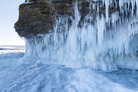 Coast of lake Baikal in winter, the deepest and largest freshwater lake by volume in the world,...