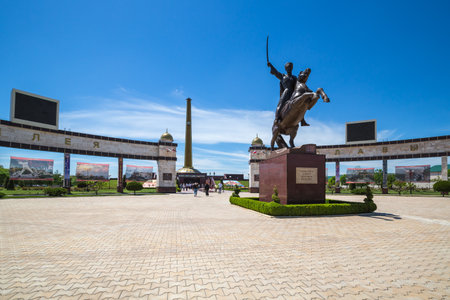 GROZNY, RUSSIA - MAY 08, 2021: Monument to Movlid Visaitov on the background of the Memorial Complex of Glory in Grozny, Chechen Republic, Russiaのeditorial素材