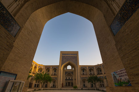 BUKHARA, UZBEKISTAN - APRIL 12, 2022: Inner courtyard of old Madrasah in Bukhara, Uzbekistan