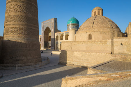 The Po-i-Kalyan Complex in Bukhara, Uzbekistan. Bukhara is a popular tourist attraction of Central Asiaの写真素材