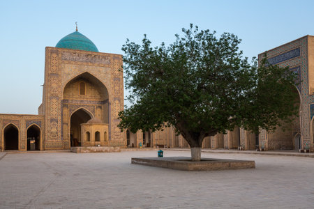 BUKHARA, UZBEKISTAN - APRIL 12, 2022: Inner courtyard of the Kalyan Mosque, part of the Po-i-Kalyan Complex in Bukhara, Uzbekistanの写真素材
