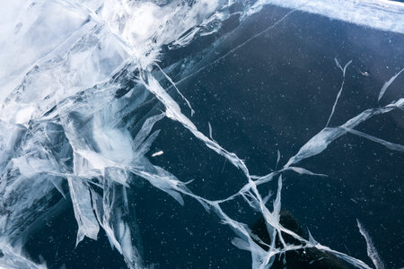 Ice of Lake Baikal, the deepest and largest freshwater lake by volume in the world, located in...