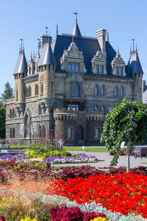 HRYASCHEVKA VILLAGE, SAMARA REGION, RUSSIA - AUGUST 01, 2023: General view of Garibaldi Castle complex with beautiful flowerbeds in the foreground. A popular tourist attraction, summer travelのeditorial素材
