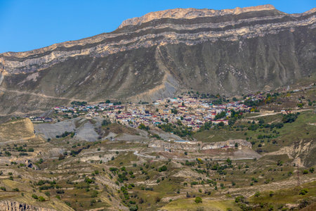 Panoramic view of autumn landscape in the mountains of Dagestan, North Caucasus, Russia. A high-mountain village Chokh located on the mountainside. Travel in highlandの写真素材