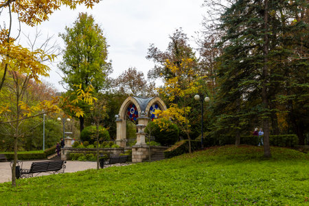 KISLOVODSK, RUSSIA - OCTOBER 06, 2023: Glass pavilion between autumn trees in Kislovodsk National Park. Kislovodsk is a resort town in the North Caucasus mountains, Caucasian Mineral Waters regionのeditorial素材