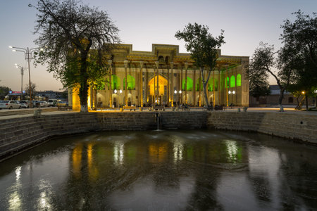 BUKHARA, UZBEKISTAN - APRIL 13, 2022: Bolo Haouz Mosque is a historical mosque in Bukhara,...