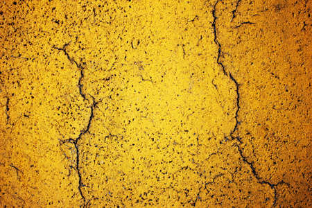 cracked yellow road texture の写真素材