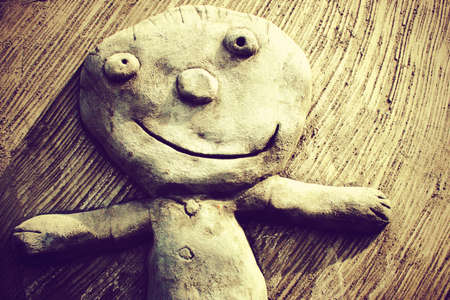 smiling child sculptureの写真素材