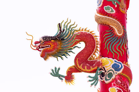 Chinese Dragon Wrapped around red pole on isolate backgroundの写真素材